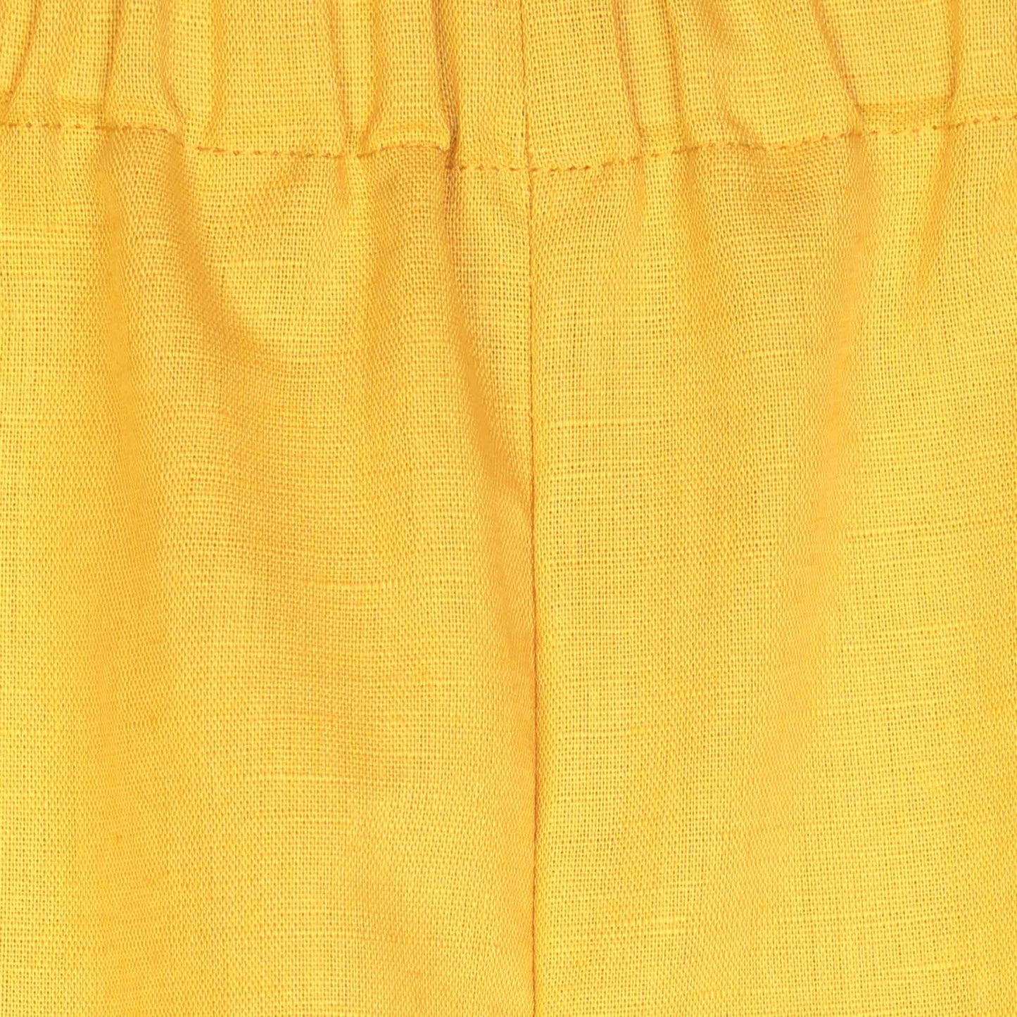 Pantapalazzo lungo giallo da bambina con elastico in vita e gamba ampia vista particolare cucitura